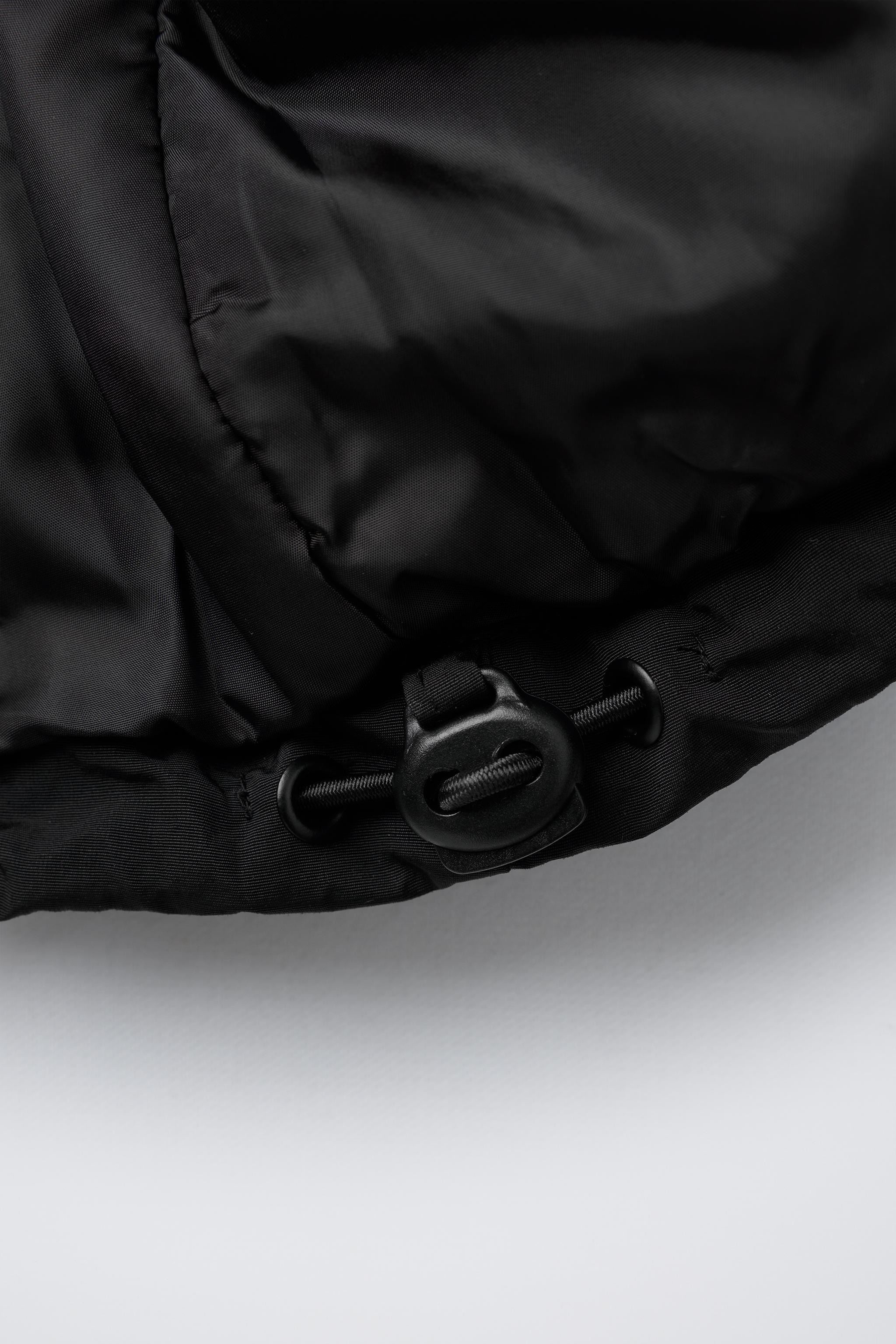 UEFA CHAMPIONS LEAGUE ® WATER REPELLENT JACKET WITH HOODIE